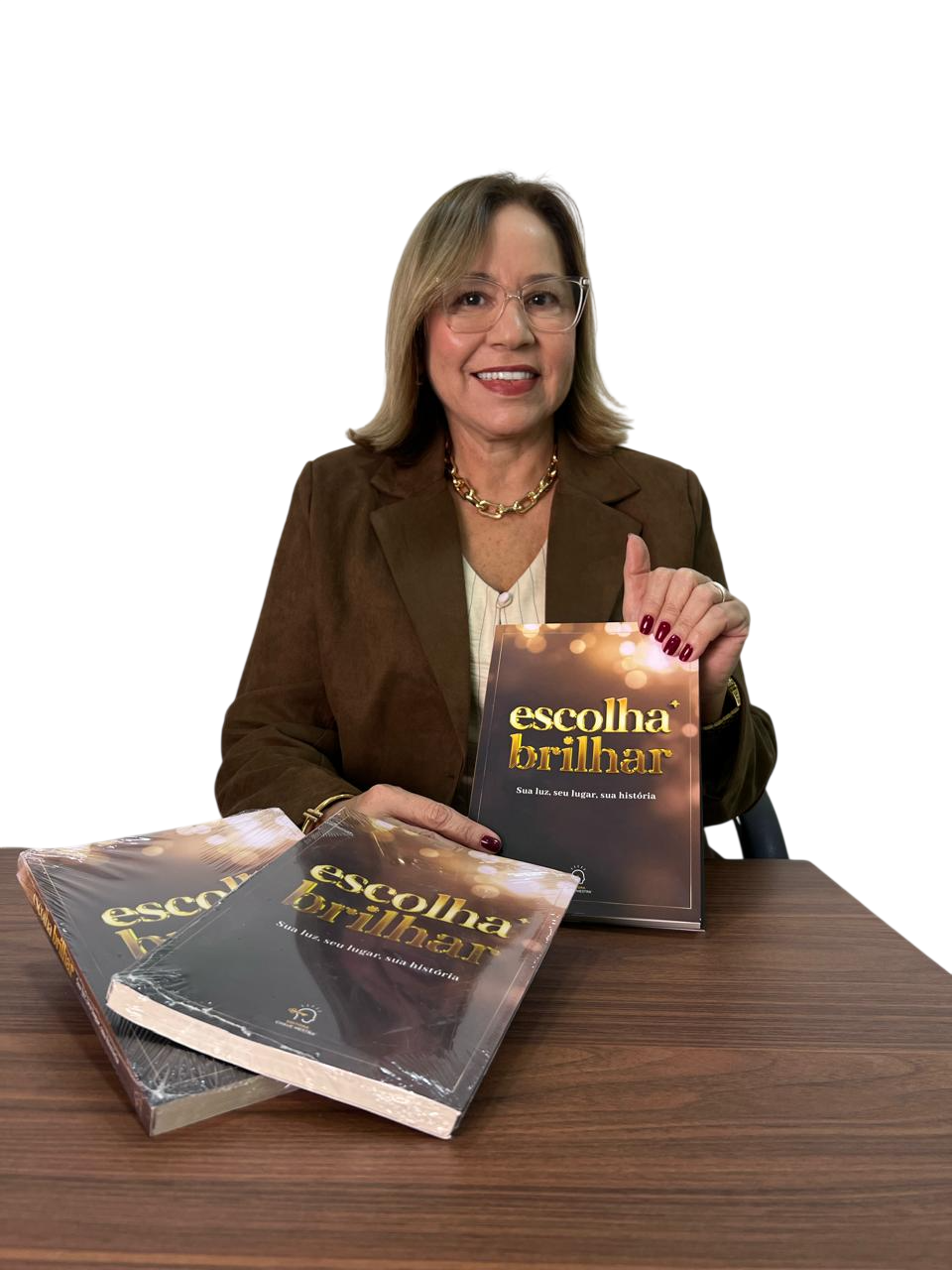 Ery Santos, tricologista e escritora, com o livro Escolha Brilhar